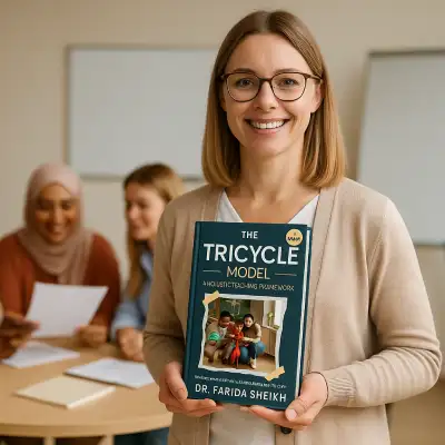 Educator holding The Tricycle Model book by Dr Farida Sheikh promoting student-centred learning